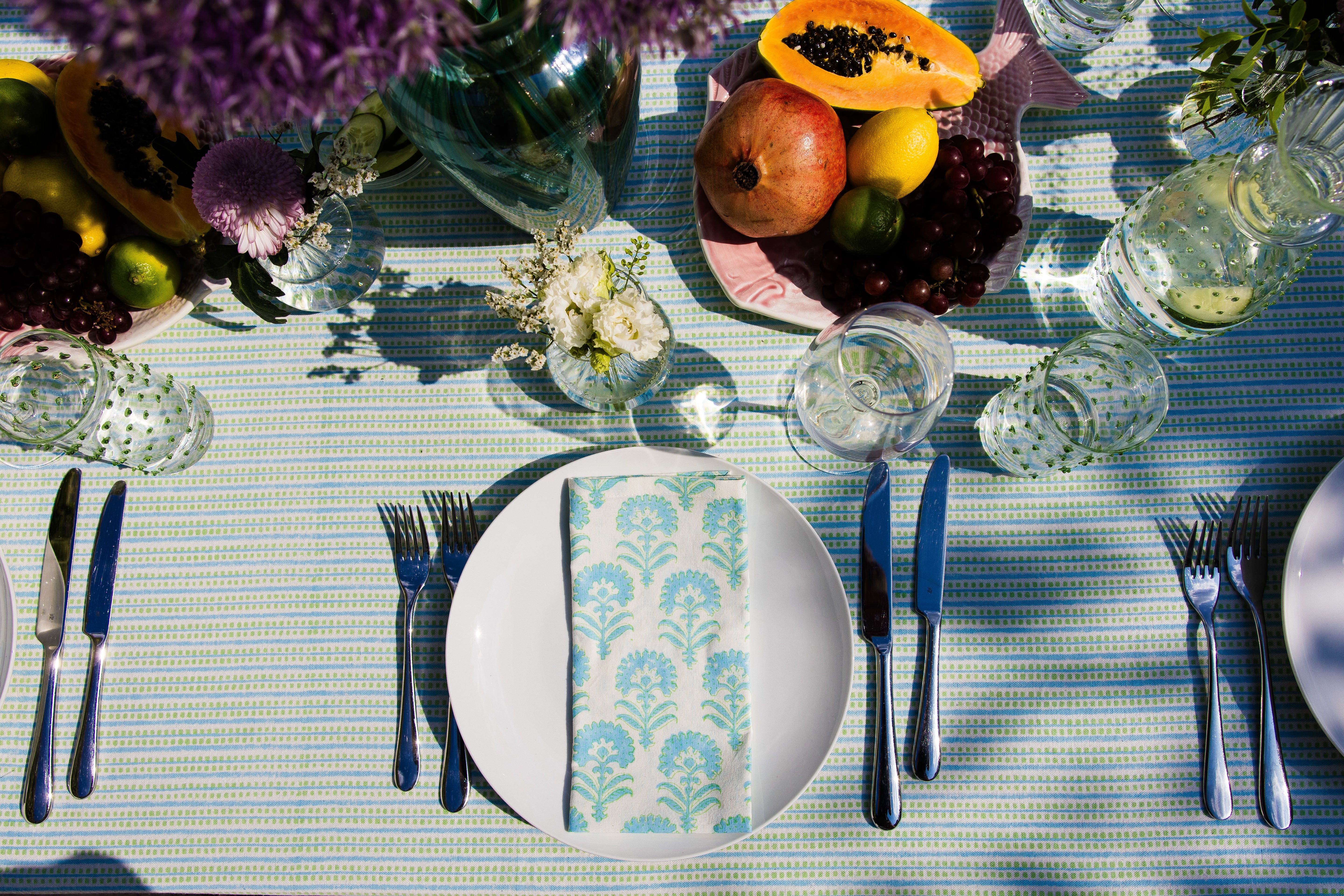 Contemporary Spring Block Printed Tablescape featuring Blue Floral Cotton Napkins and a Green and Turquoise Tablecloth
