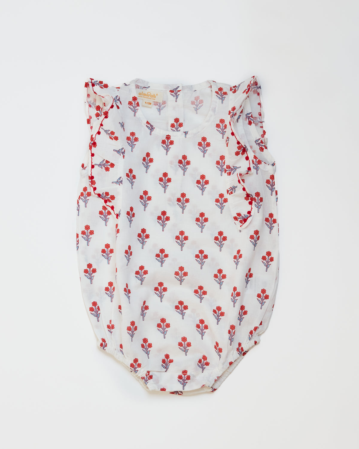 Cotton babygrow in petunia print for babies, with frilled cap sleeves
