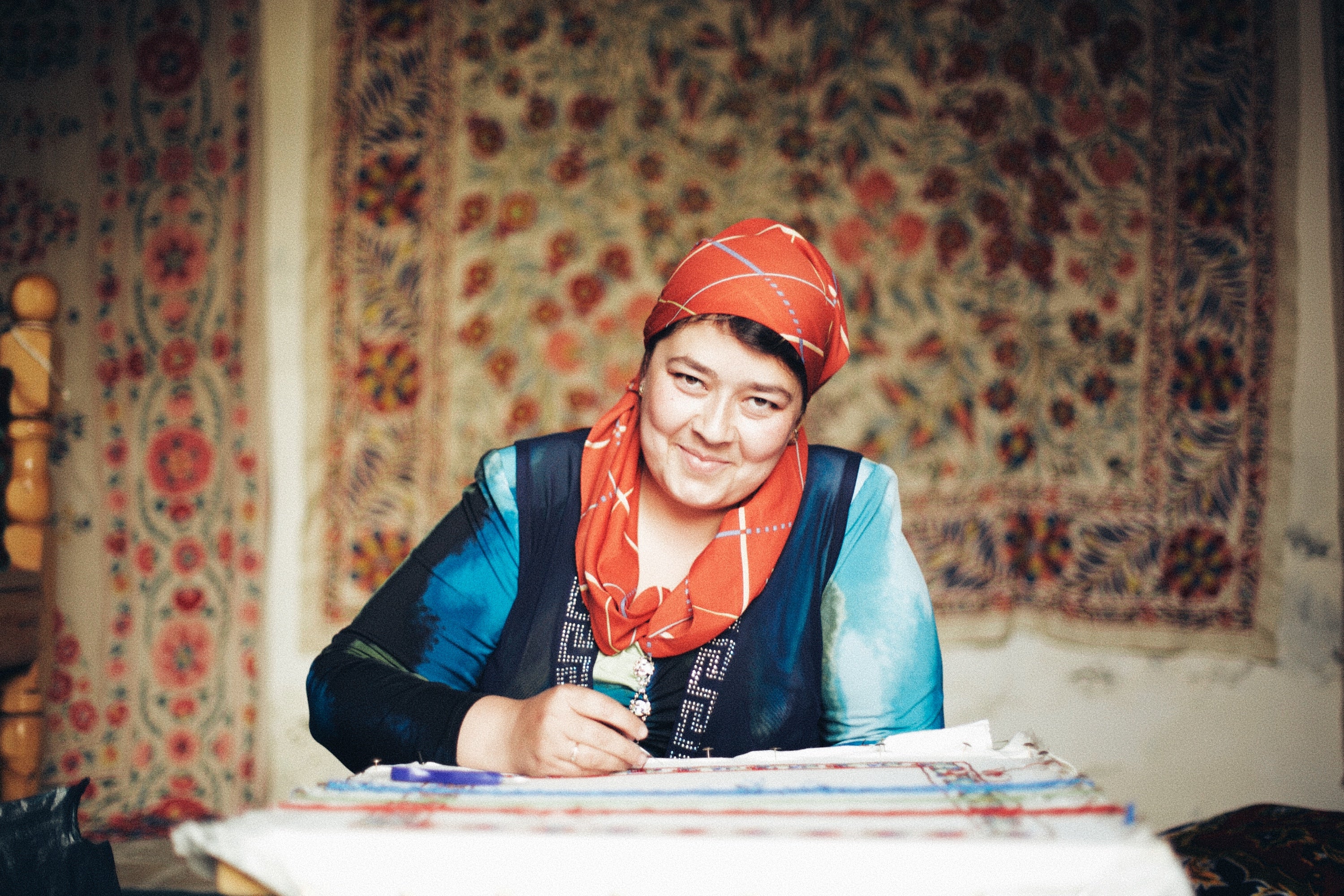 Suzani woman Ikat artisan