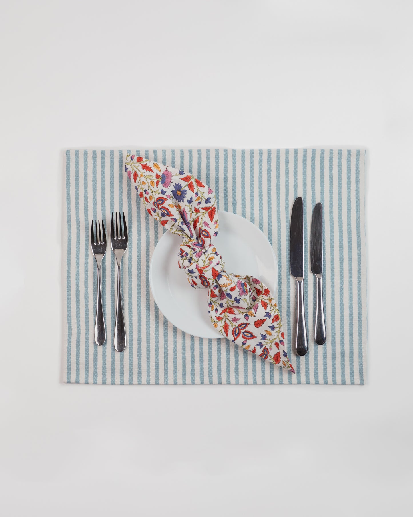 Set of 4 Floral and Stripe Napkins in Indigo & Burnt Orange