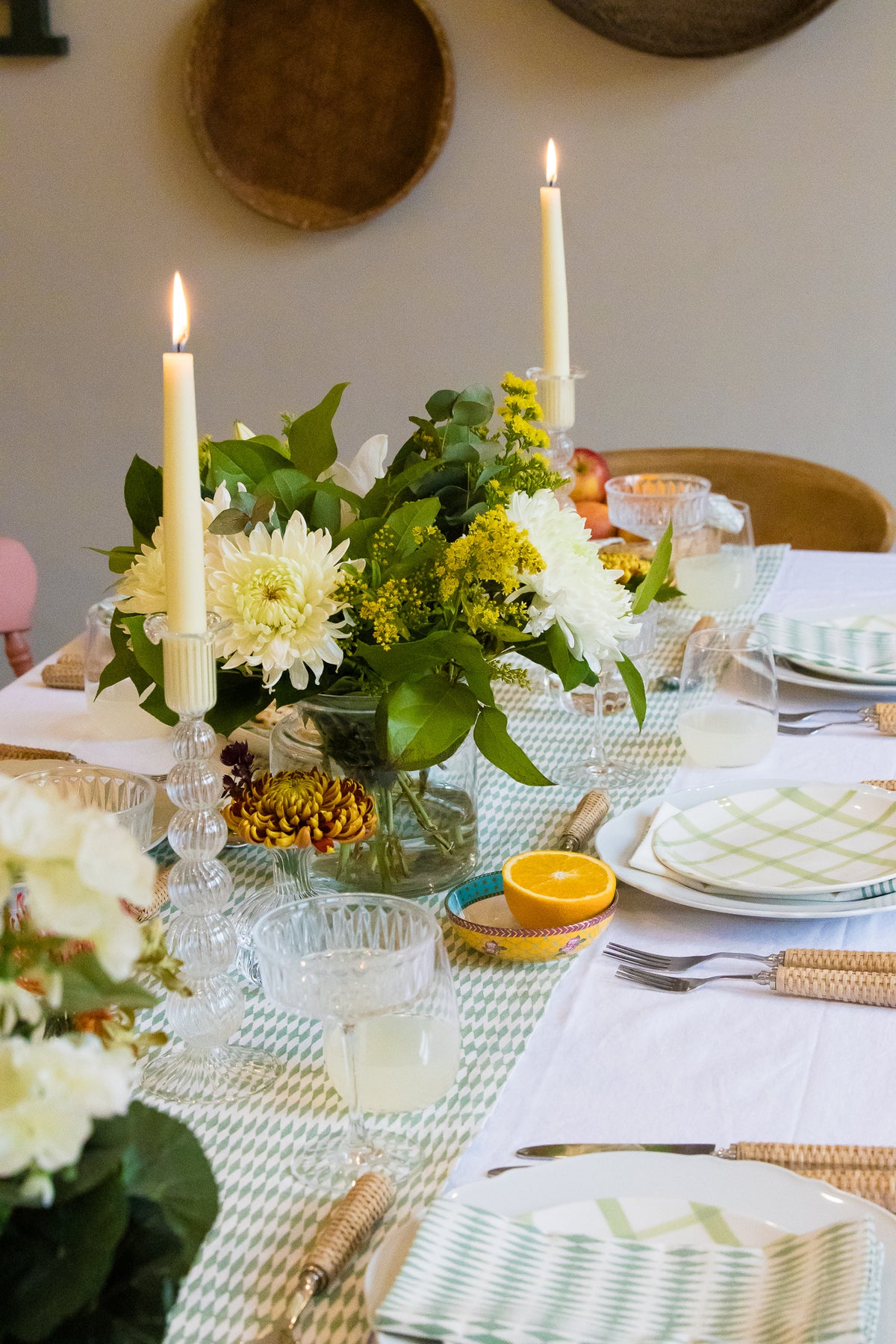Elegant table setting with candles, flowers, and place settings on a Sage Green Harlequin Pattern Block Printed Cotton Table Runner.