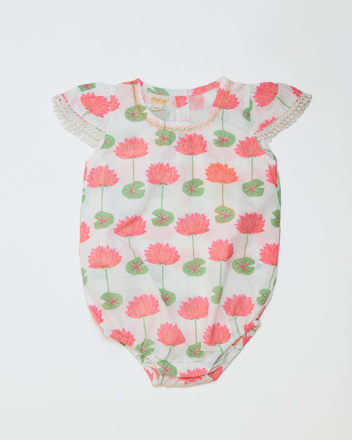 Cotton babygrow in pink lotus print for babies, with frilled cap sleeves