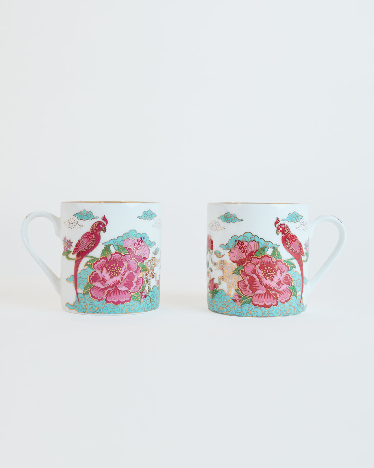 Set of 2 fine bone china tropical mugs in white with cerise parrot design and gold detailing